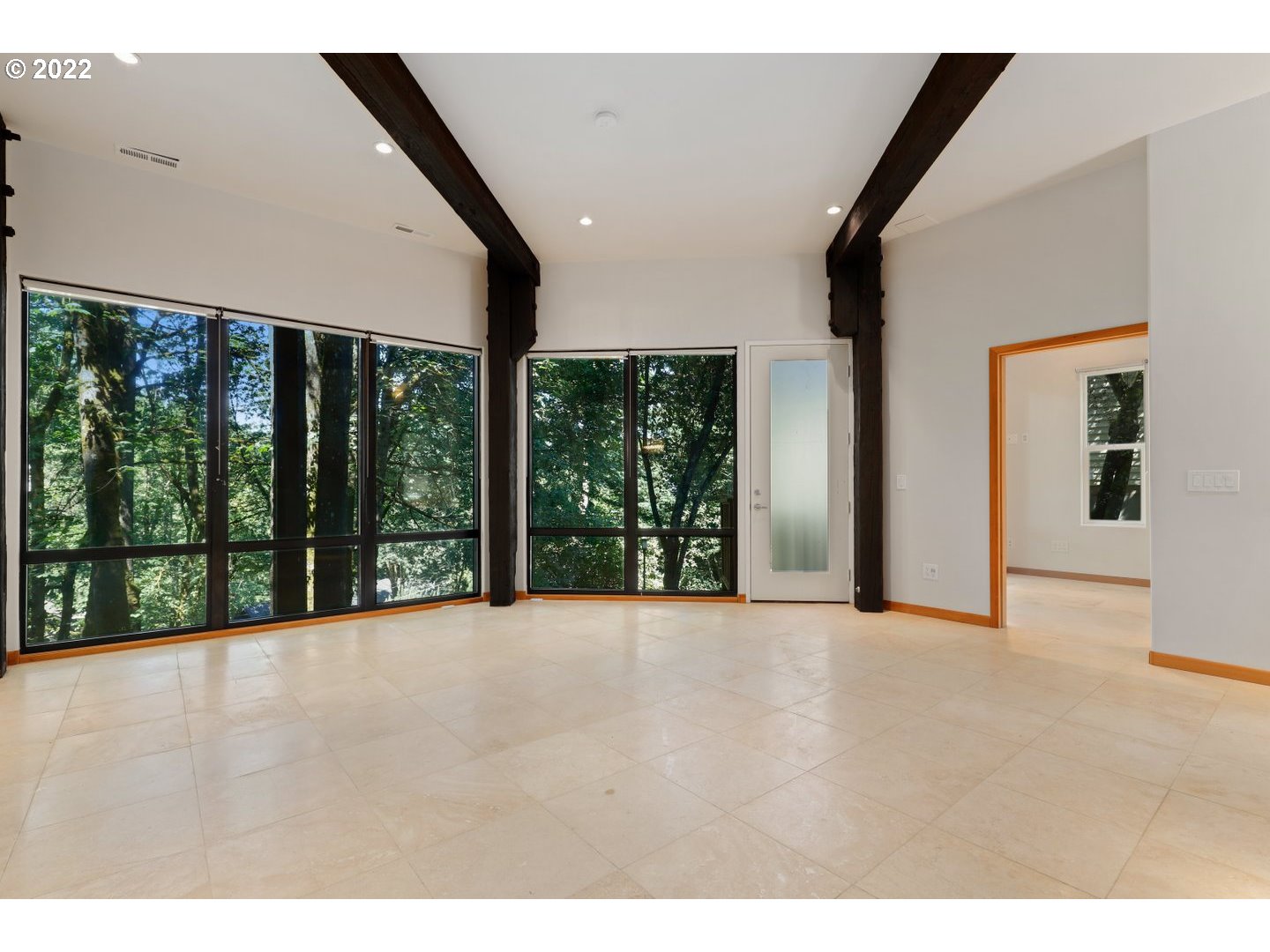 3143 Southwest Sherwood Place Portland, OR 97201 - Photo 21 of 32 a view of an empty room with a large window