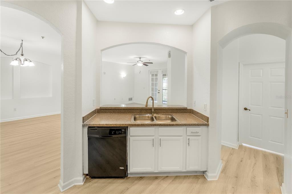 3351 Whitestone Circle, Unit 304 Kissimmee, FL 34741 - Photo 6 of 21 a bathroom with a sink and a mirror