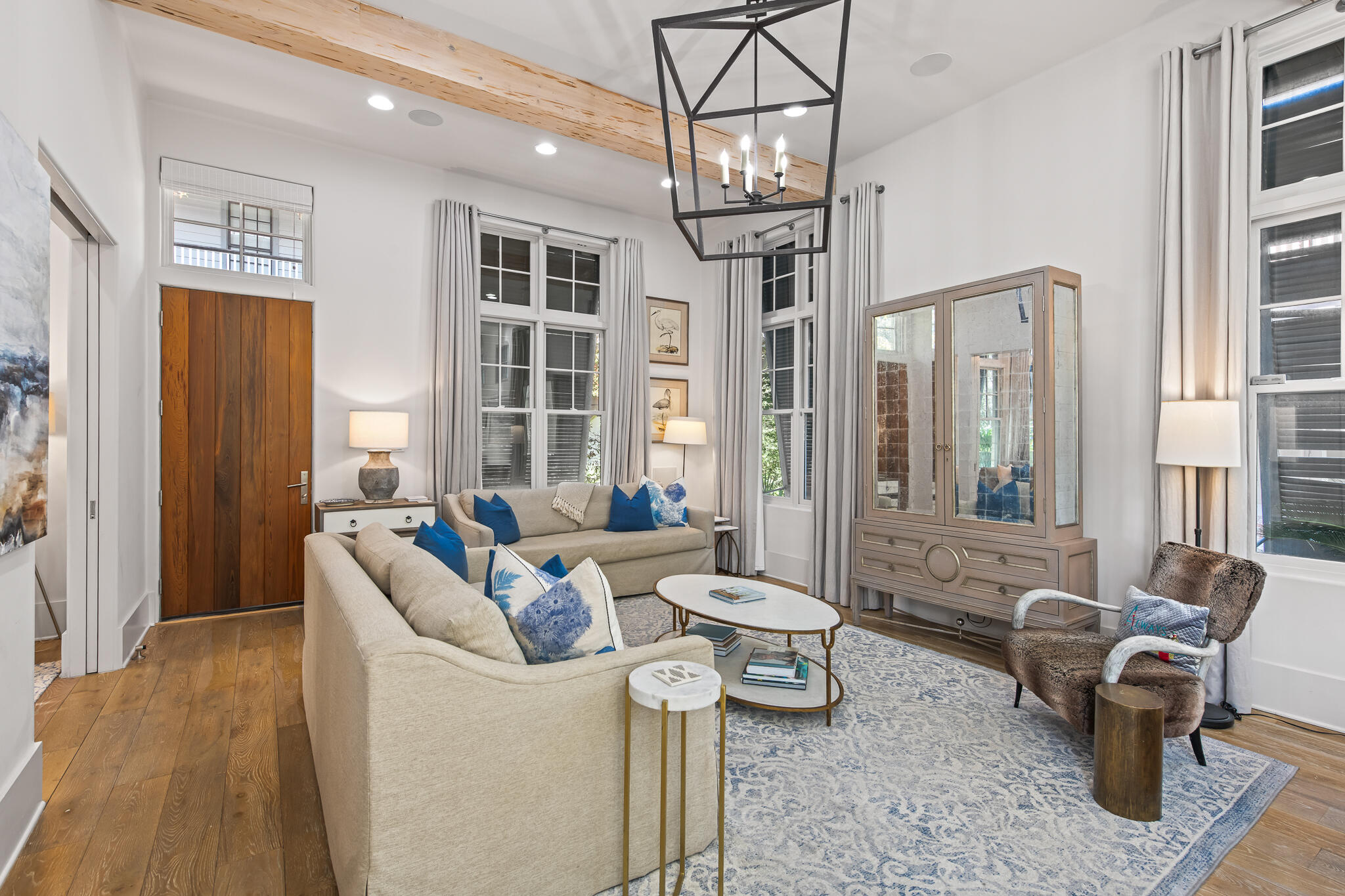 188 Round Road Inlet Beach, FL 32461 - Photo 29 of 98 a living room with furniture a chandelier and a large window