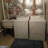 7057 Gresham Court West Frederick, MD 21703 - Photo 5 of 9 Lower level nice sized laundry room washer/dryer