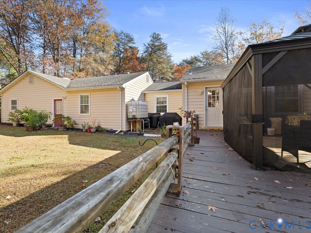 15415 Hopeful Church Road Bumpass, VA 23024 - Photo 11 of 27 a view of a house with backyard and sitting area