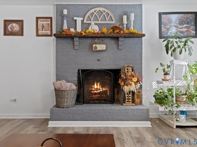 a fireplace with wooden floor