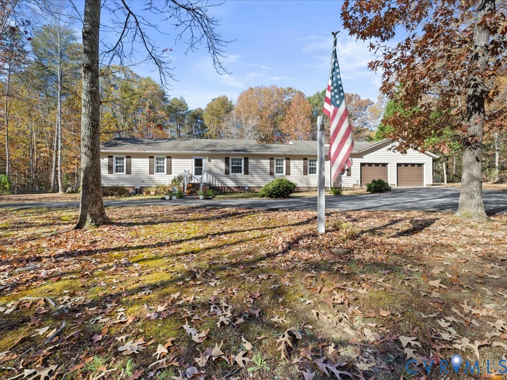 15415 Hopeful Church Road Bumpass, VA 23024 - Photo 26 of 27 a front view of a house with a yard
