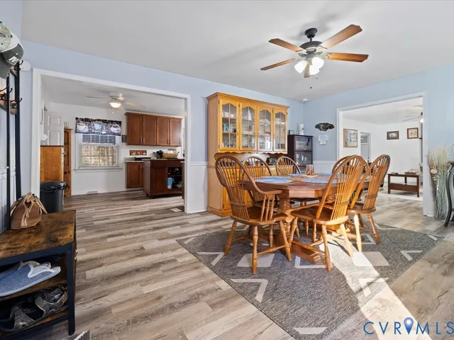 a kitchen with stainless steel appliances granite countertop a stove a sink dishwasher and a refrigerator