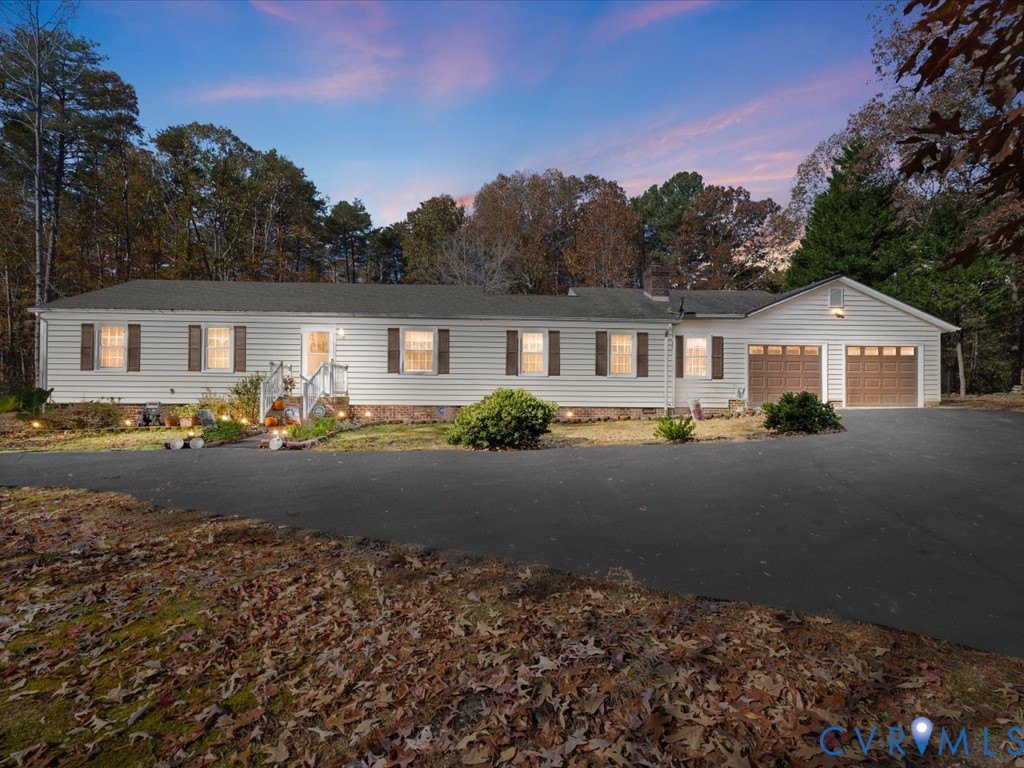 15415 Hopeful Church Road Bumpass, VA 23024 - Photo 5 of 27 a front view of a house with garden