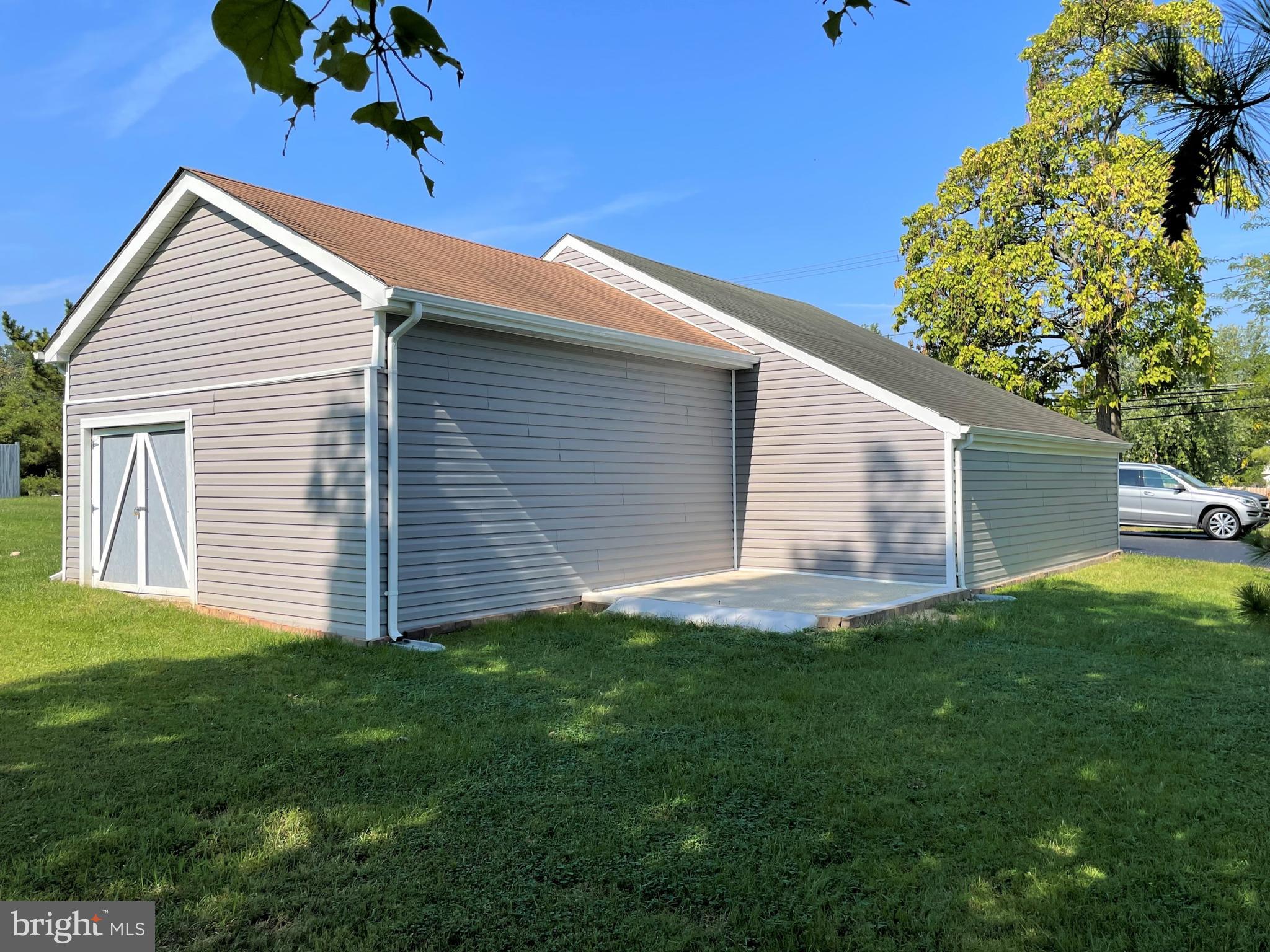 9401 Philadelphia Road Baltimore, MD 21237 - Photo 30 of 46 Rear if detached garage with patio and rear access