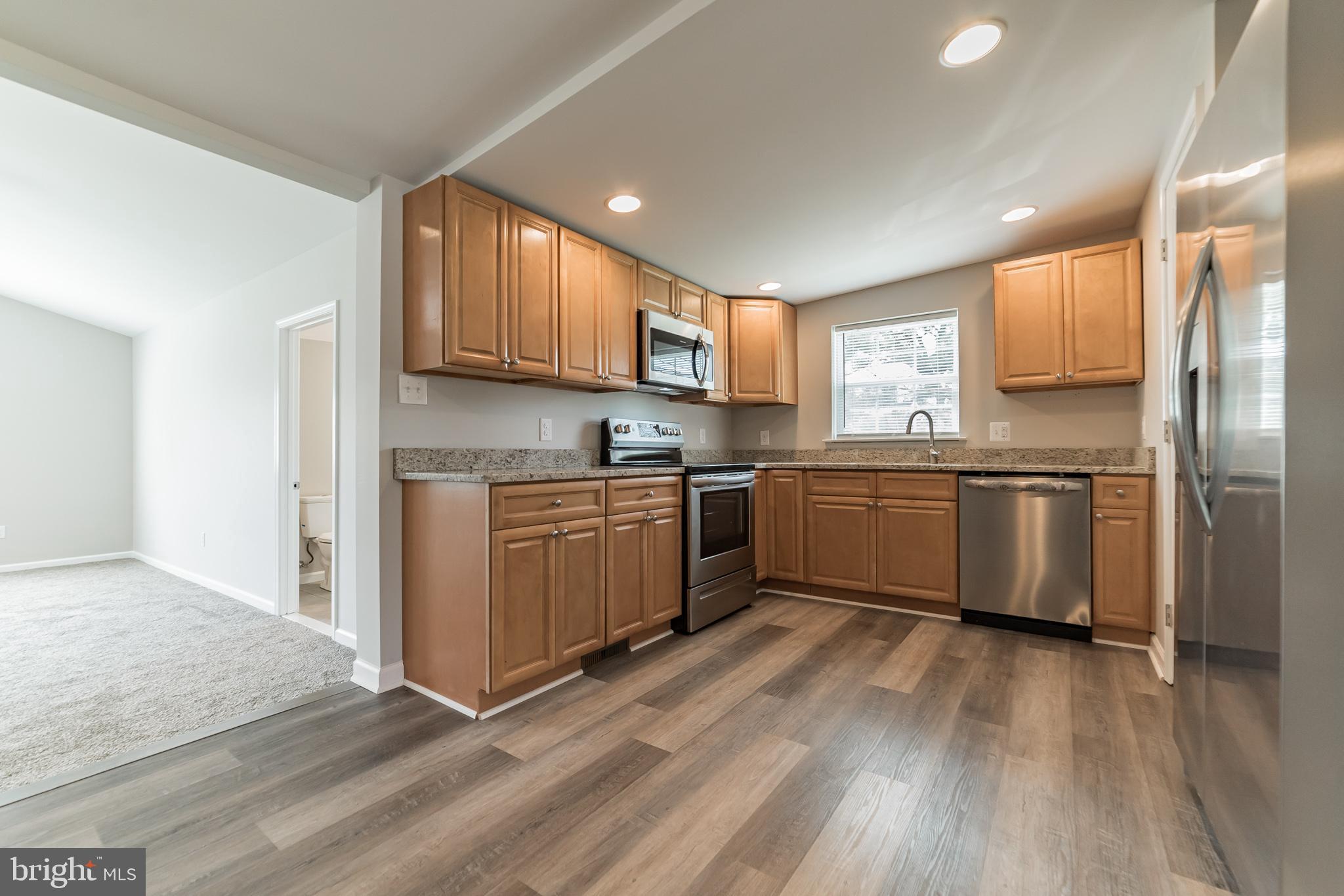 9401 Philadelphia Road Baltimore, MD 21237 - Photo 8 of 46 Gourmet Kitchen w/SS appl, granite, & upgrade cabs