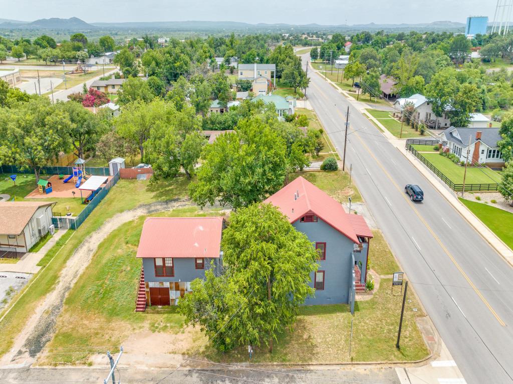 1600 Ford Street Llano, TX 78643 - Photo 35 of 37 an aerial view of a house with a yard and lake view