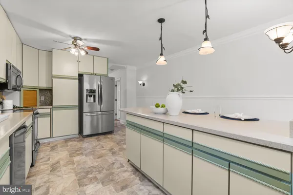 a utility room with sink dryer and washer