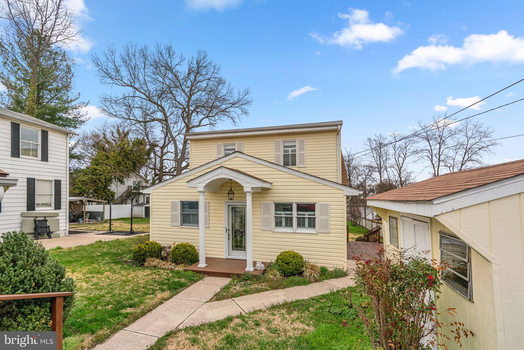452 Carvel Beach Road Carvel Beach, MD 21226 - Photo 2 of 71 a front view of a house with garden
