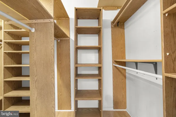 a living room with furniture a dining table and kitchen view