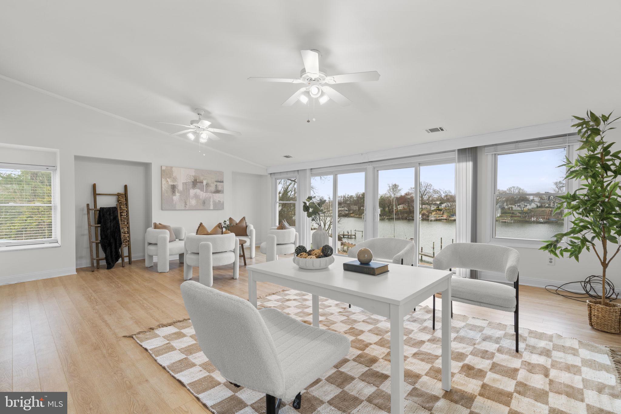 452 Carvel Beach Road Carvel Beach, MD 21226 - Photo 35 of 71 a living room with furniture and a large window
