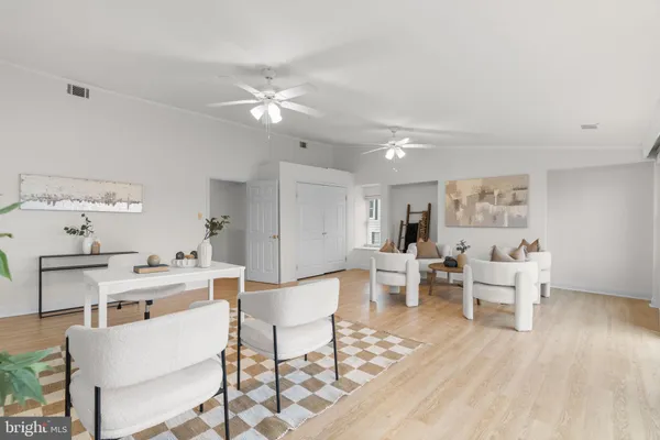 a view of a lake with houses in the back