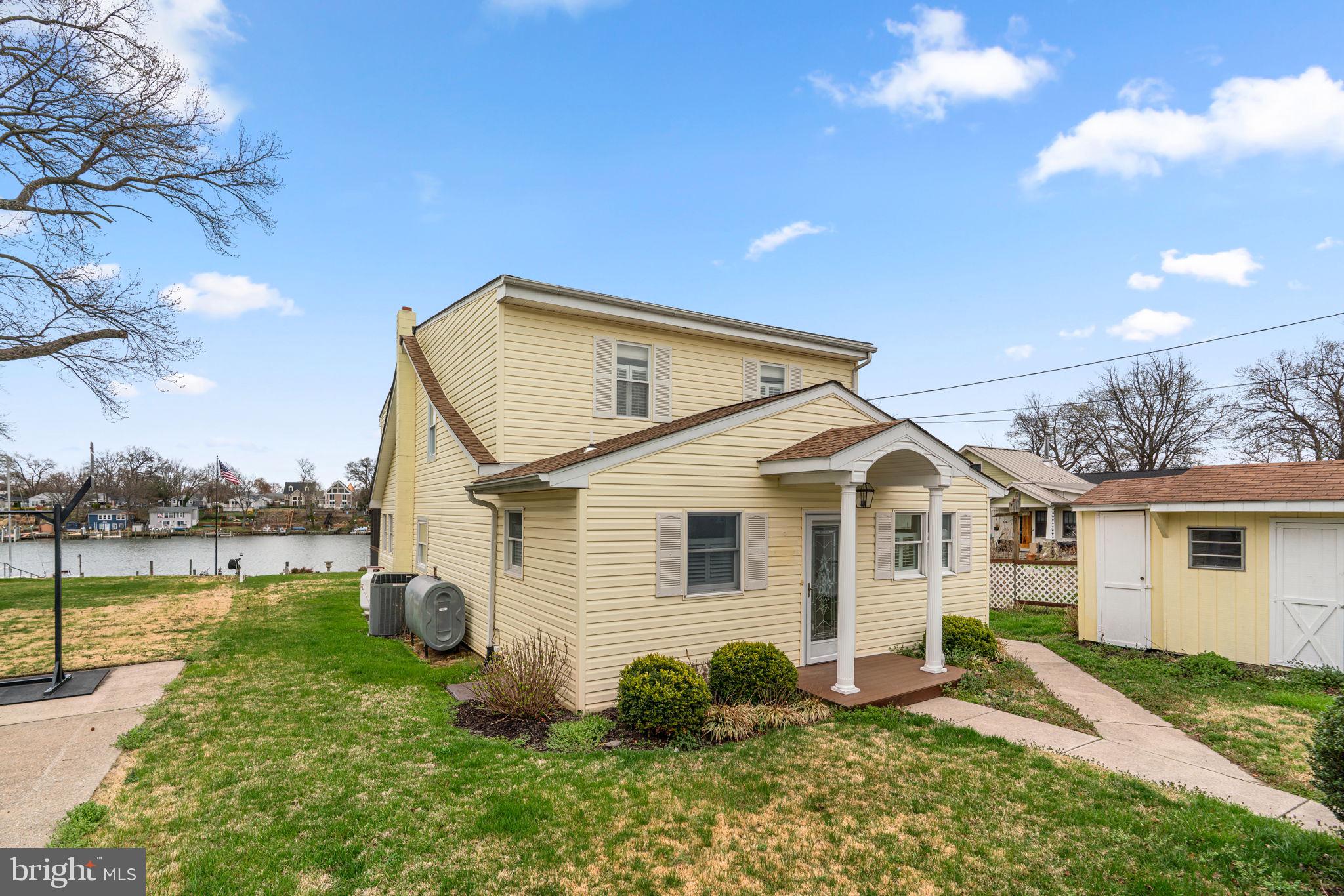 452 Carvel Beach Road Carvel Beach, MD 21226 - Photo 4 of 71 a view of a house with a yard