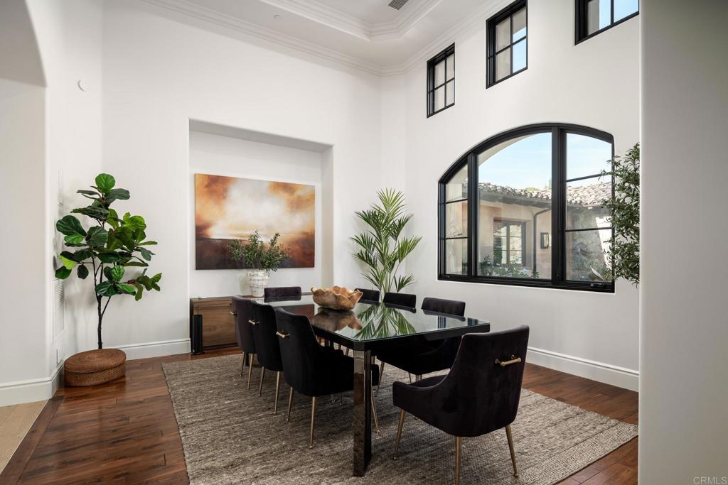 18000 Sunset Point Road Poway, CA 92064 - Photo 10 of 36 a living room with furniture and a potted plant