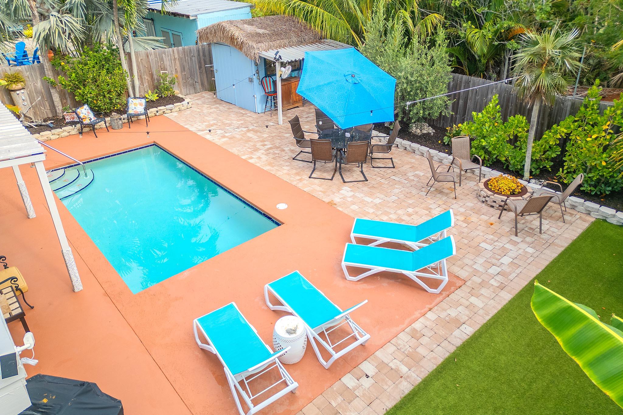 29827 Tropical Trader Road Big Pine Key, FL 33043 - Photo 29 of 32 an outdoor sitting area with chairs