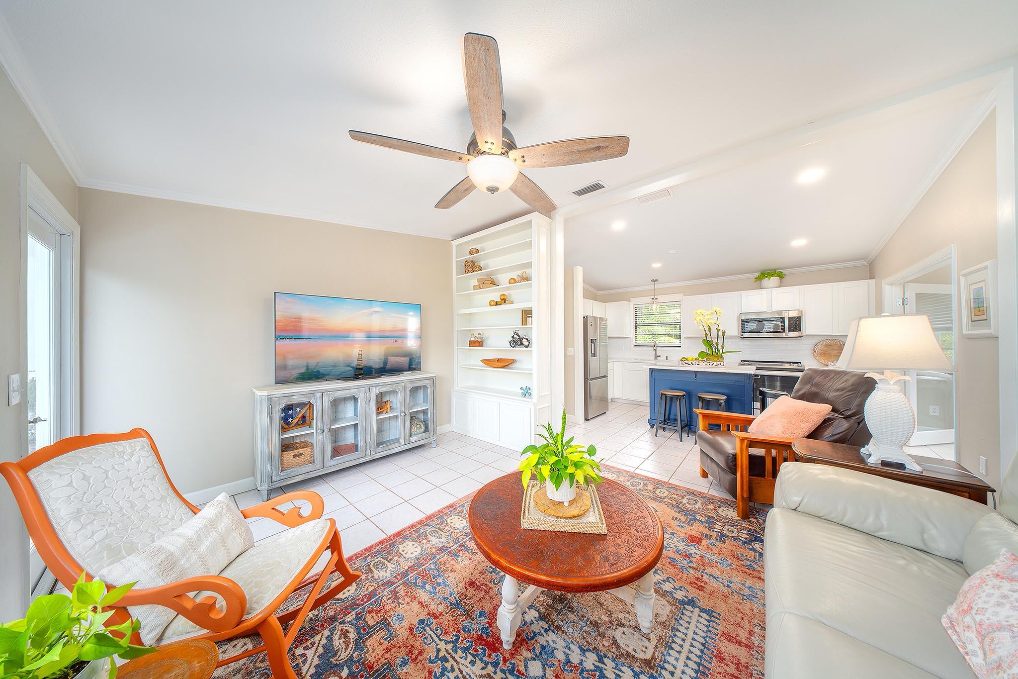 29827 Tropical Trader Road Big Pine Key, FL 33043 - Photo 5 of 32 a living room with furniture and a flat screen tv