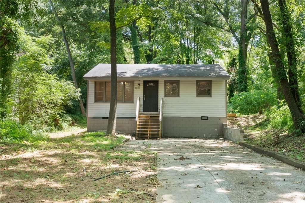 2850 3rd Avenue Southwest Atlanta, GA 30315 - Photo 1 of 1 a house with a tree in the background