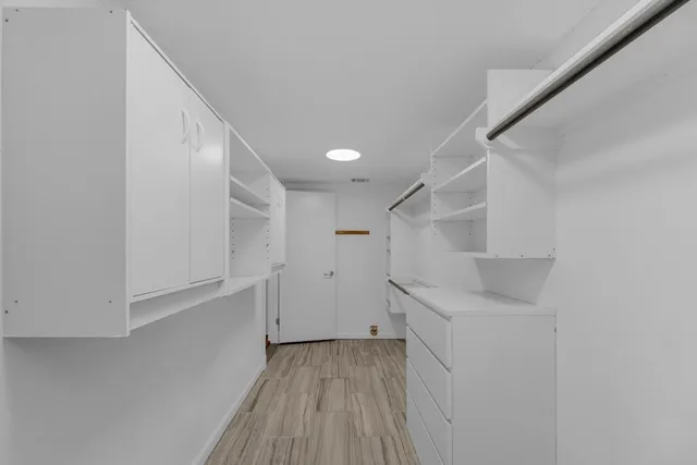 a view of a walk in closet