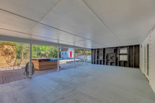 a view of a chairs and table in a room
