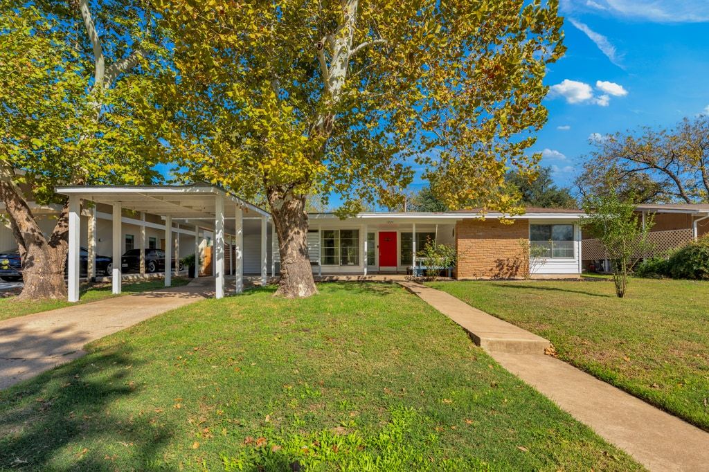 1224 Corona Drive Austin, TX 78723 - Photo 6 of 37 front view of a house with a big yard