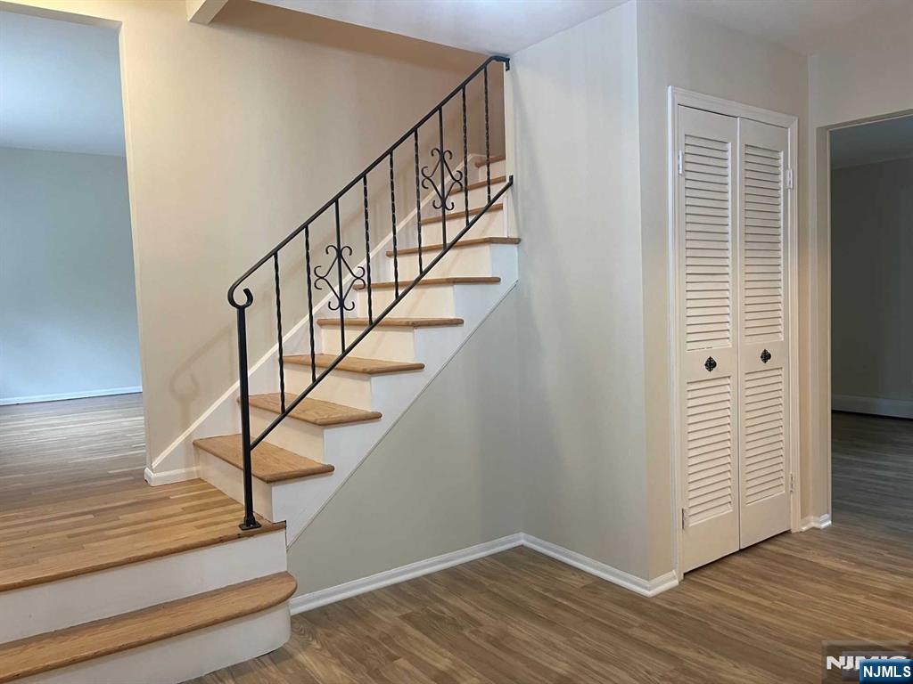 338 Queens Court Ridgewood, NJ 07450 - Photo 17 of 25 a view of entryway and hall with wooden floor