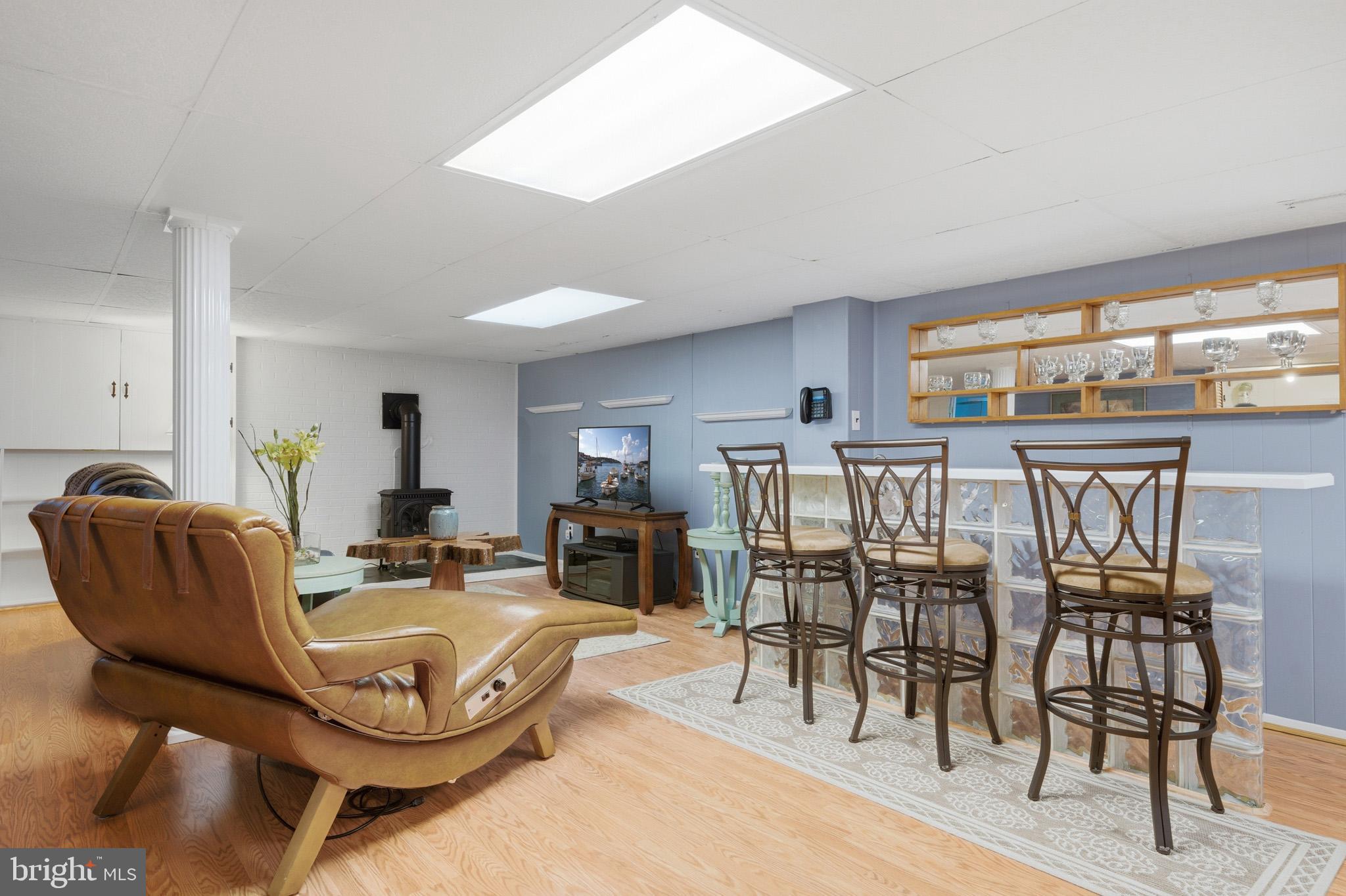 100 David Gray Road St. Leonard, MD 20685 - Photo 39 of 61 Movie nights are perfect in this space.