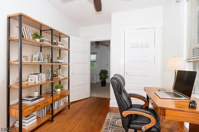 a workspace with furniture and rug