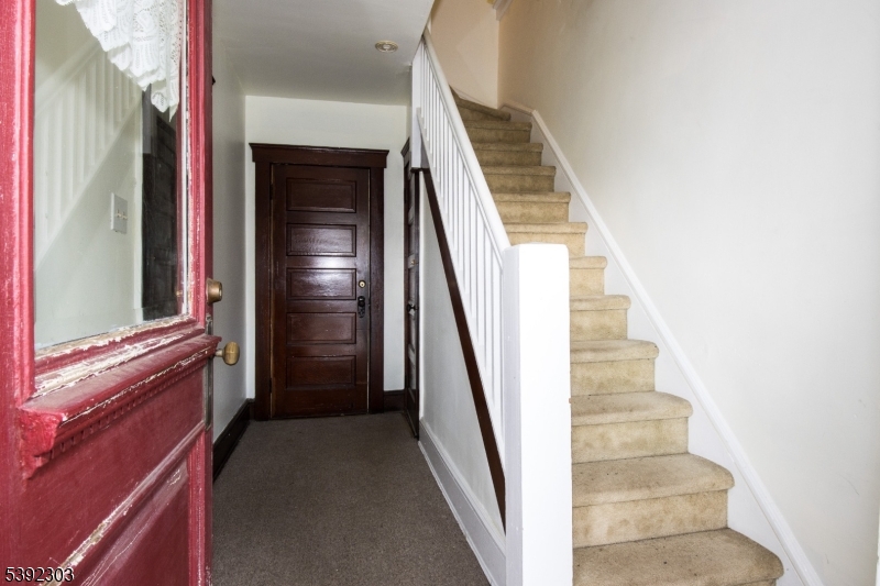 94 2nd Avenue Garwood, NJ 07027 - Photo 7 of 12 a view of staircase with railing and white walls