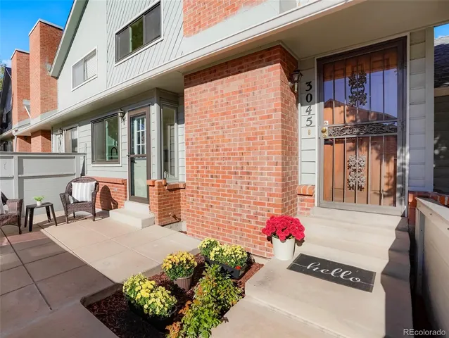a view of a building with sitting area