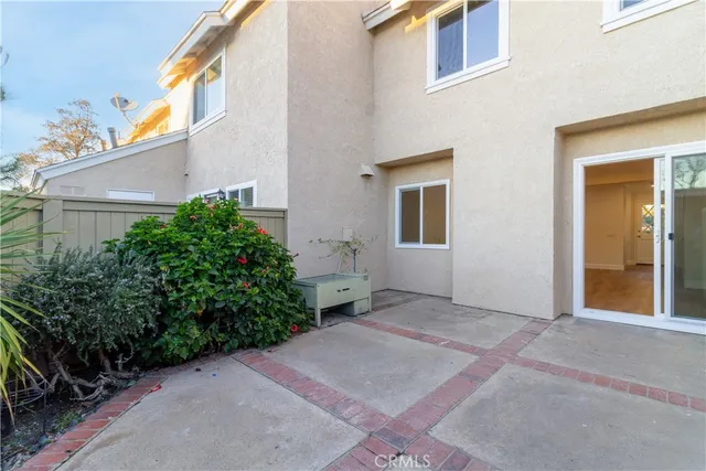a view of an empty room with a mirror