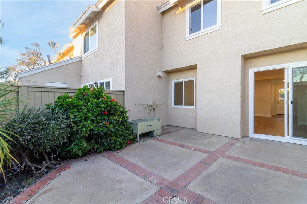 31 Windjammer Irvine, CA 92614 - Photo 17 of 31 a view of a house with backyard and garden
