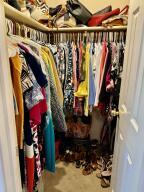 1515 Southwest 19th Terrace Okeechobee, FL 34974 - Photo 17 of 39 a view of walk in closet with clothes and shoes