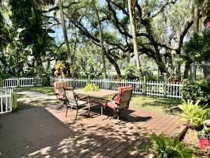 1515 Southwest 19th Terrace Okeechobee, FL 34974 - Photo 2 of 39 a view of a bench in a backyard