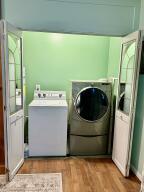 1515 Southwest 19th Terrace Okeechobee, FL 34974 - Photo 22 of 39 a utility room with washer and dryer