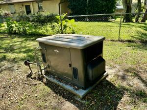 1515 Southwest 19th Terrace Okeechobee, FL 34974 - Photo 26 of 39 a view of a house with a yard