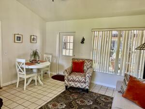 1515 Southwest 19th Terrace Okeechobee, FL 34974 - Photo 6 of 39 a living room with furniture and wooden floor