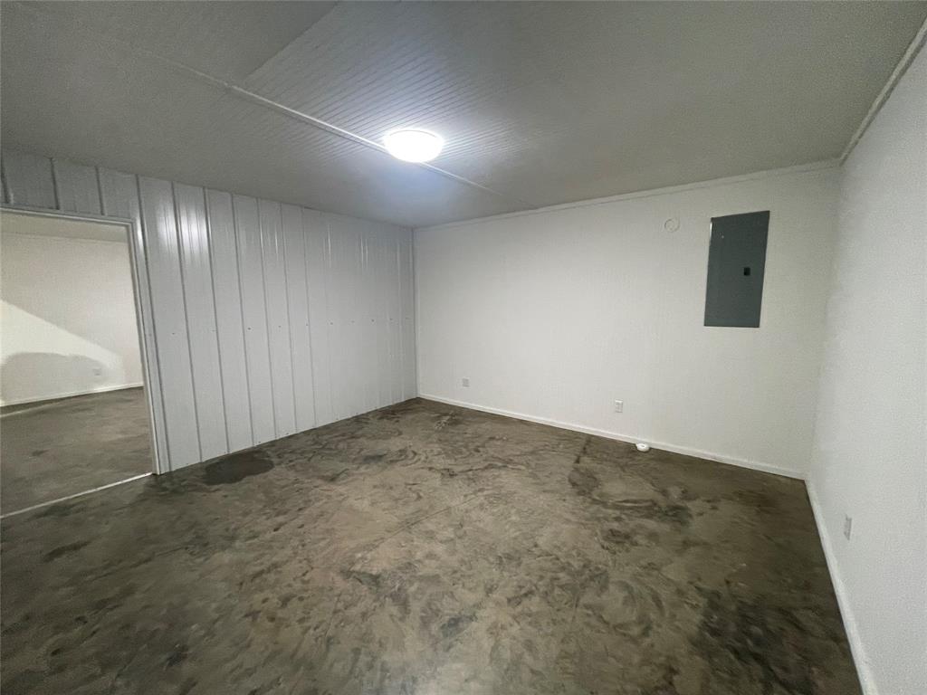 180 Cr 3320 Road Avery, TX 75554 - Photo 17 of 18 an empty room with a empty space and windows