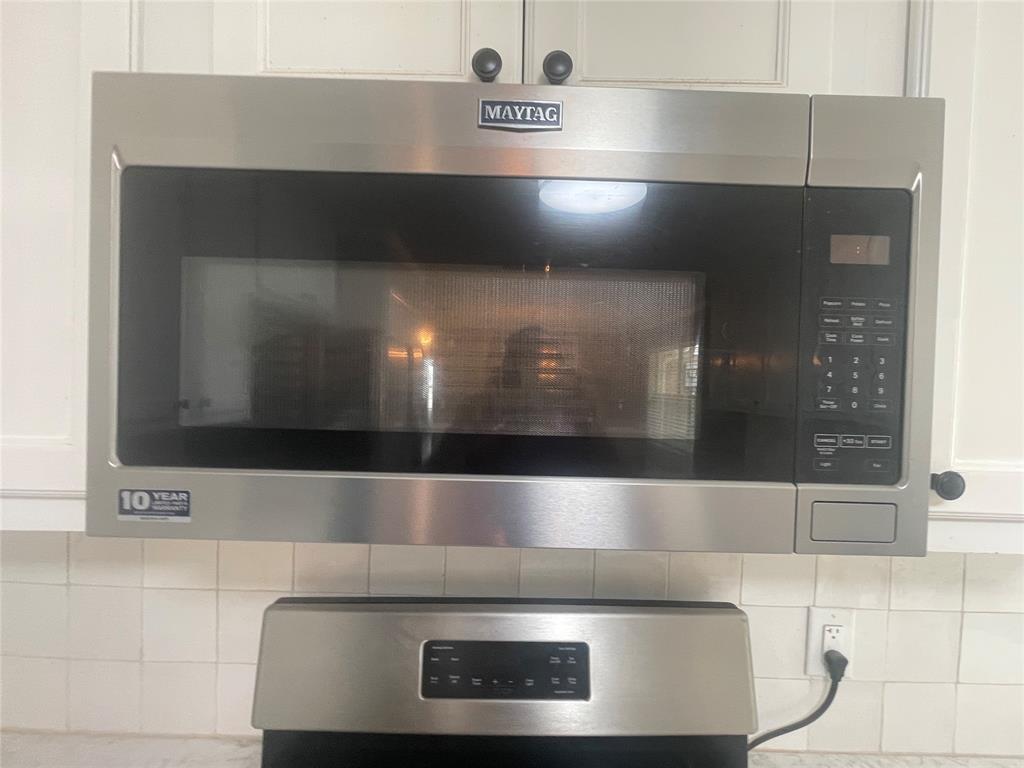 180 Cr 3320 Road Avery, TX 75554 - Photo 8 of 18 a closeup of a stove