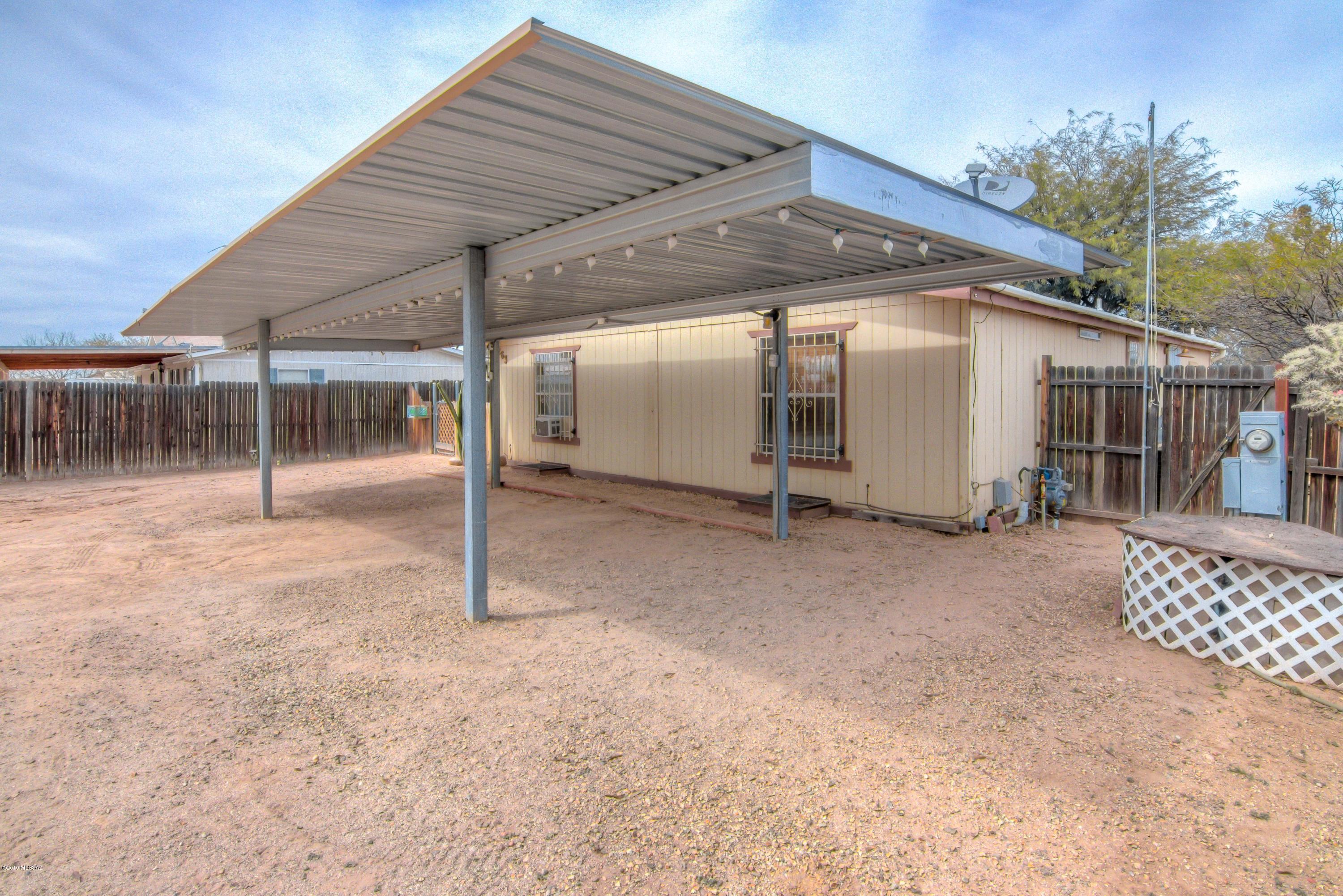 263 East Roger Road Tucson, AZ 85705 - Photo 6 of 31 a backyard of a house