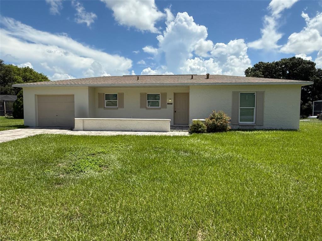 front view of house with a yard