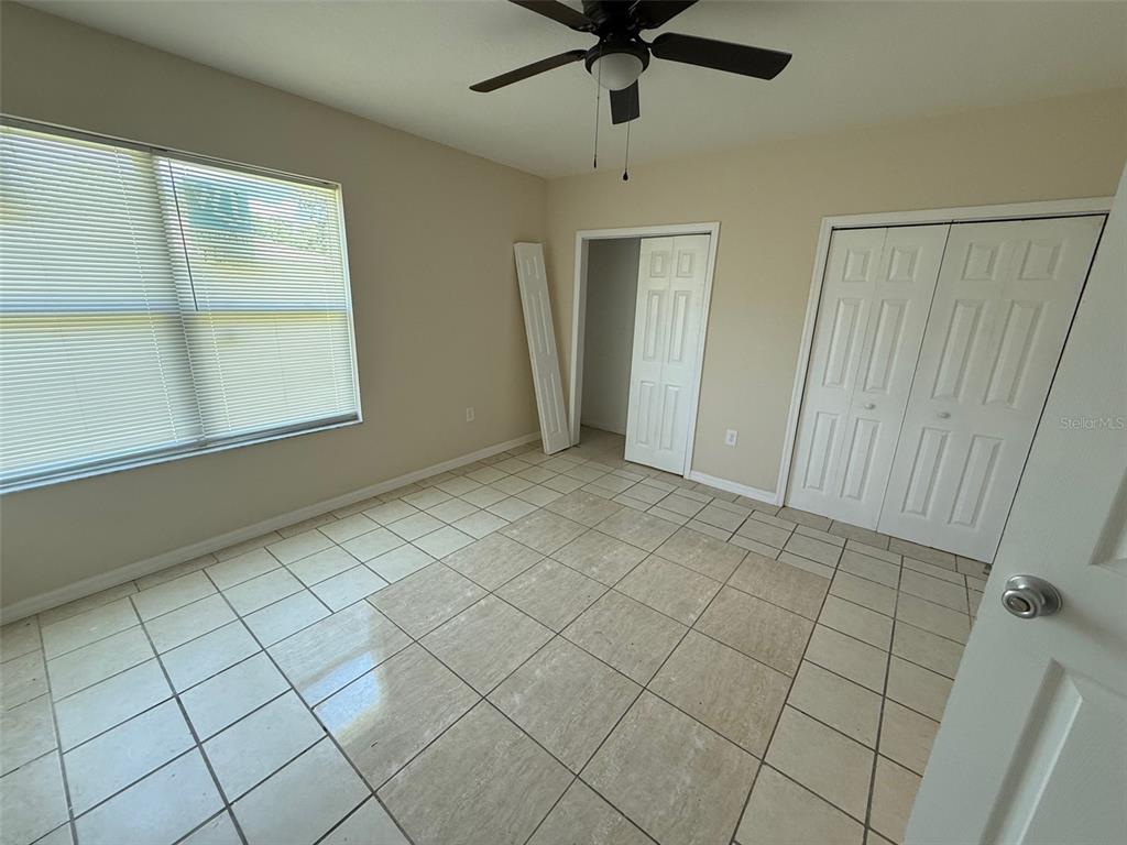 7319 Holiday Drive Spring Hill, FL 34606 - Photo 11 of 20 a view of an empty room and window