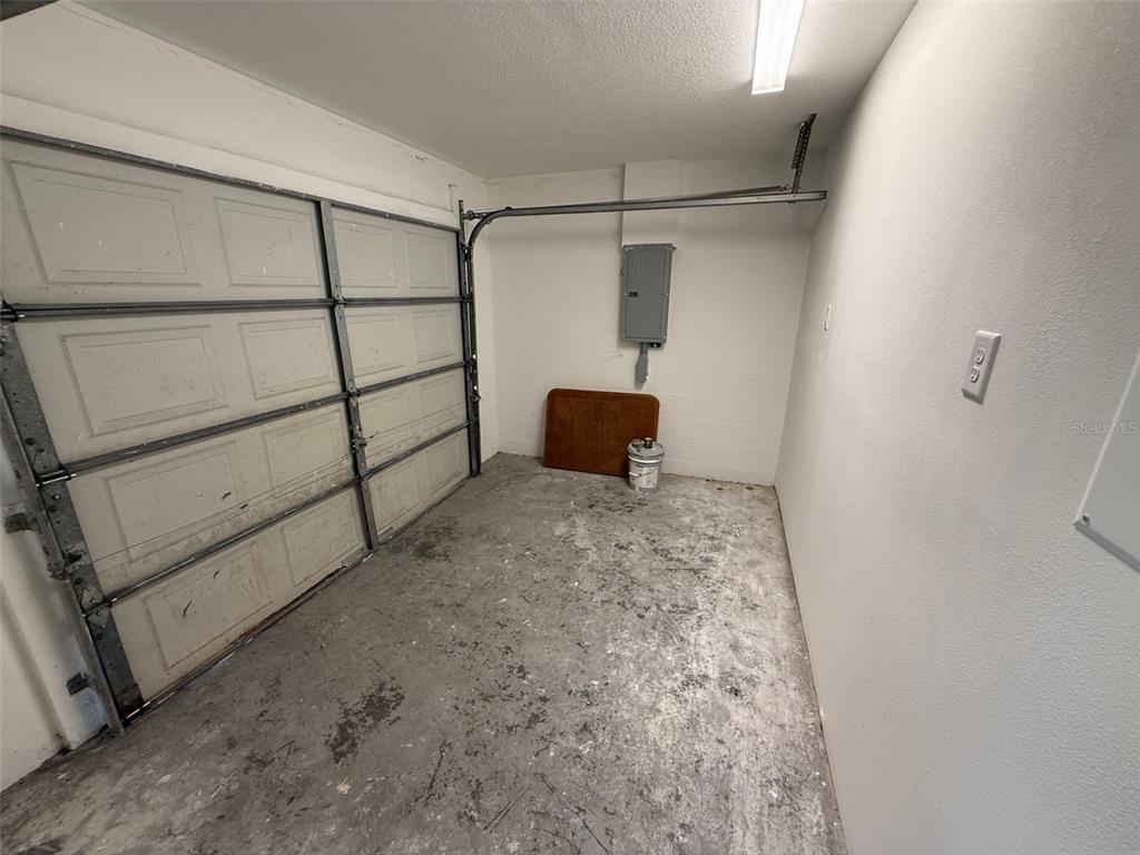 7319 Holiday Drive Spring Hill, FL 34606 - Photo 14 of 20 a view of a garage
