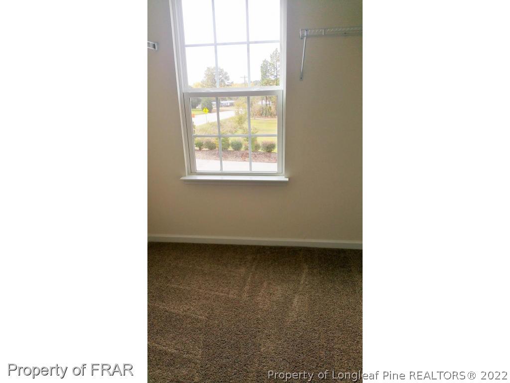 12 River Oak Street Spring Lake, NC 28390 - Photo 17 of 34 a view of a room that has a window in it
