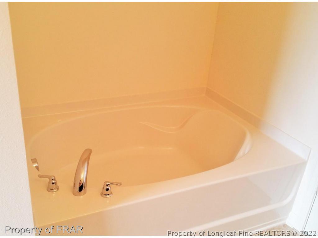 12 River Oak Street Spring Lake, NC 28390 - Photo 20 of 34 a view of bathtub
