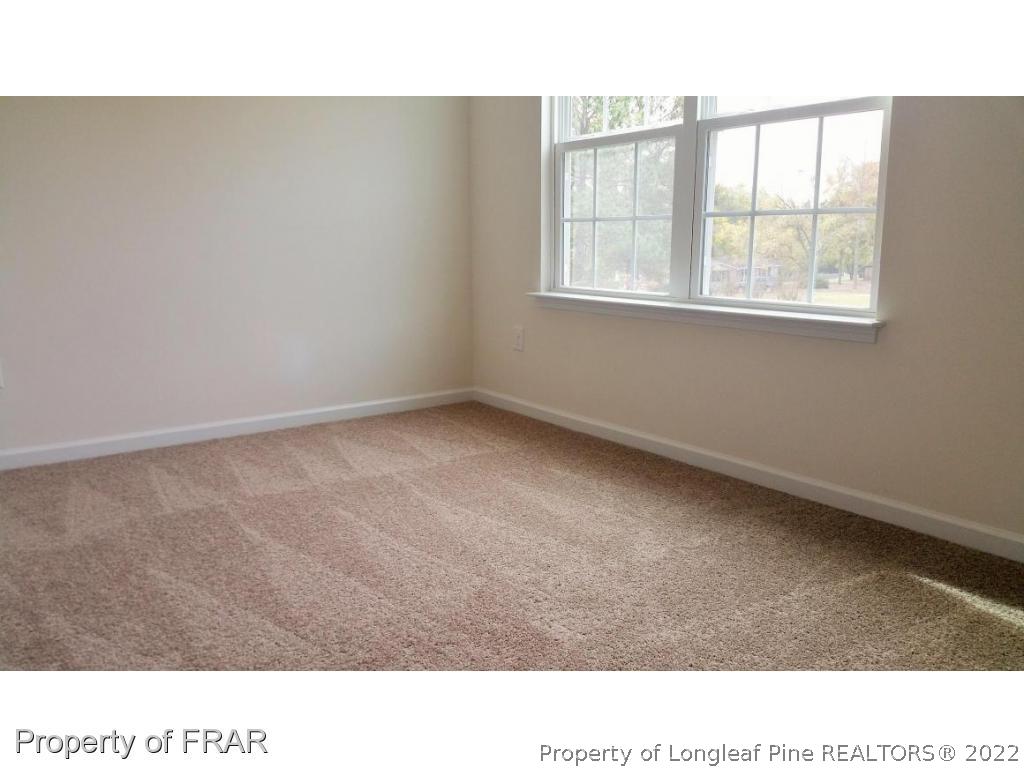 12 River Oak Street Spring Lake, NC 28390 - Photo 22 of 34 a black and white photo of a room