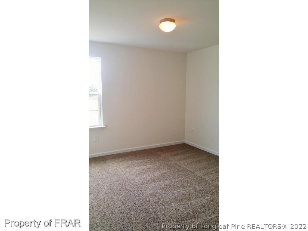 12 River Oak Street Spring Lake, NC 28390 - Photo 25 of 34 a view of an empty room