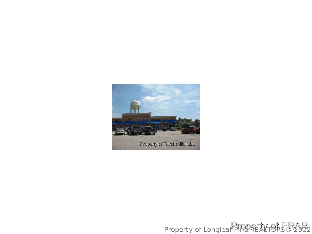 12 River Oak Street Spring Lake, NC 28390 - Photo 31 of 34 a picture of building with a outdoor space