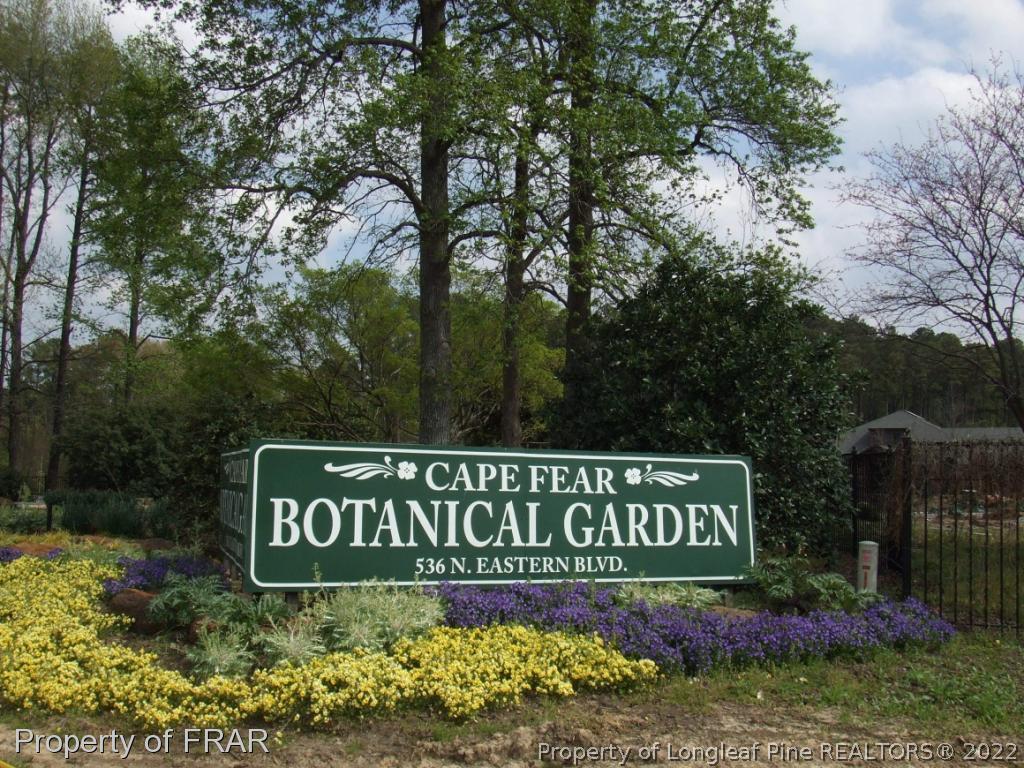 12 River Oak Street Spring Lake, NC 28390 - Photo 33 of 34 a sign that is sitting on a open area of the house