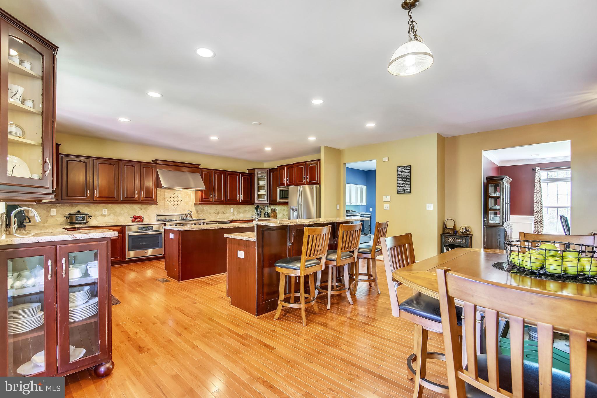 10819 Avonlea Ridge Place Damascus, MD 20872 - Photo 13 of 65 Recessed Lighting Illuminates the Kitchen
